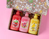 Three bubbles and bubs products in a gift box, inside the box you find Rosie the strawberry, Melly the water Mellon and Sunny the banana shampoo bottles from bubbles and bubs